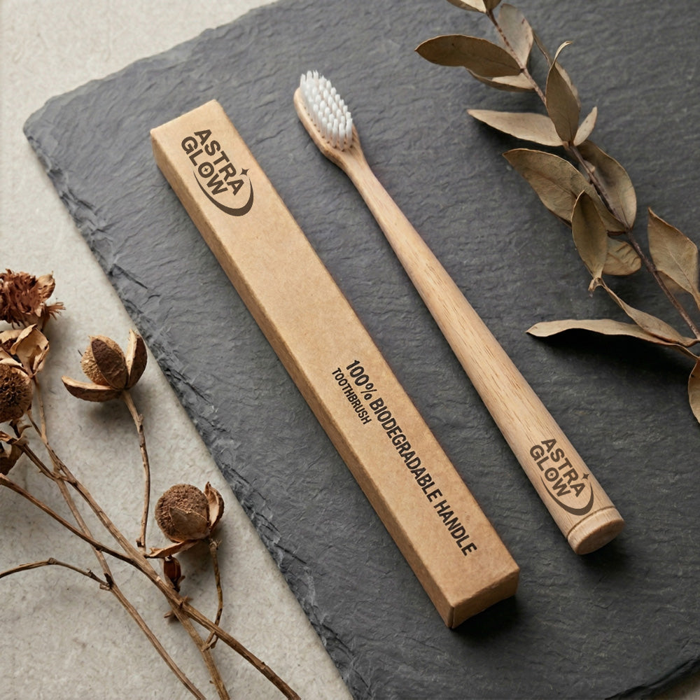 Eco-friendly bamboo toothbrush with biodegradable handle and box on slate, natural decor