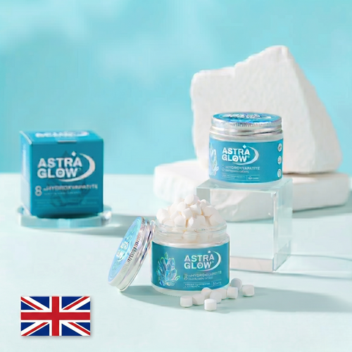 AstraGlow 8% hydroxyapatite tooth enamel repair tablets in blue jars with UK flag, promoting healthy smiles